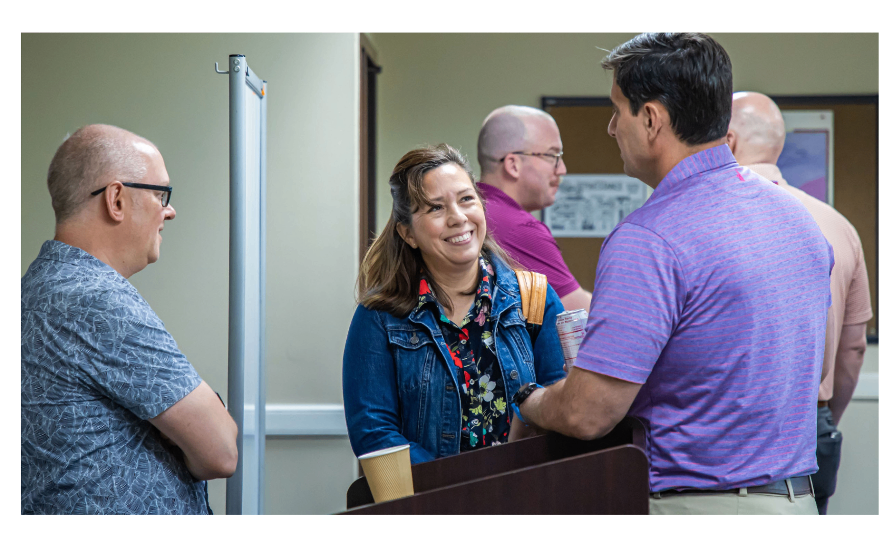 Church members talking in a lobby conversation